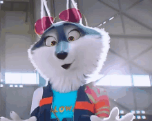 a husky mascot is wearing sunglasses and a shirt that says low