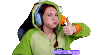 a woman giving a thumbs up with the words level 6 twitch.tv/fiamma visible behind her