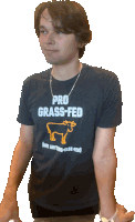 a man wears a shirt that says pro grass fed