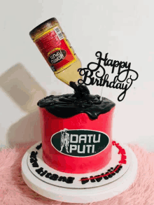 a birthday cake with a bottle of date puti pouring out of it .