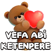 a teddy bear holding a red heart with the words vefa abi ketenpere written below it .