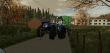 a blue new holland tractor is driving down a dirt road