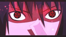 a close up of a person 's eyes with red stars in them