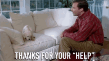 a man sits on a couch with a puppy and says thanks for your " help "