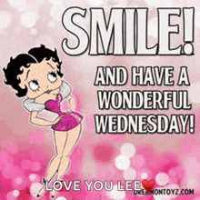 betty boop is smiling and saying " smile and have a wonderful wednesday "