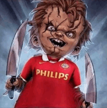 chucky is wearing a red philips jersey and holding two knives .