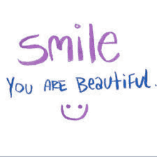 a purple and white sign that says `` smile you are beautiful '' .