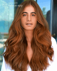 a woman with long red hair is being made with the reface app