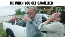 two men are laughing in front of a white truck with the caption " me when you get cancelled "