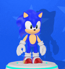 a blue sonic the hedgehog standing on a white platform