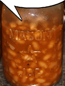 a jar of baked beans has a speech bubble above it