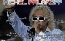 a man singing into a microphone with the name michel palareff on the bottom