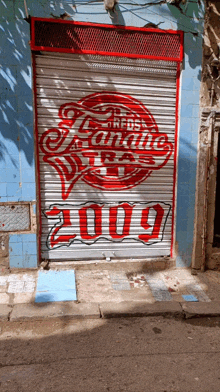 a store front with a red and white sign that says 2009 on it