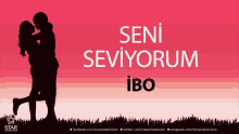 a silhouette of a man and woman kissing with the words seni seviyorum ibo