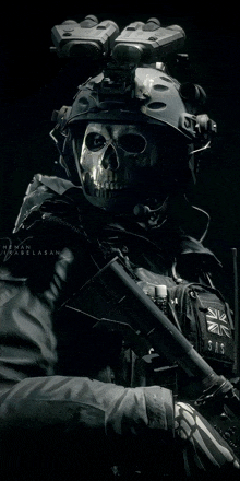 a soldier with a skull on his face is wearing a helmet and holding a rifle