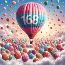 a hot air balloon with the number 168 on it is surrounded by colorful lollipops