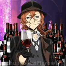 a man in a hat is holding a glass of wine in front of a bunch of wine bottles .