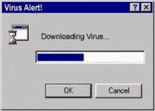 a couple kissing in front of a virus alert screen