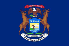 the flag of michigan is a blue flag with two deer and an eagle .