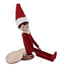 a stuffed elf is sitting on a pile of coins .