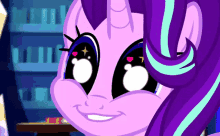 a cartoon pony with purple hair and a horn