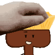 a hand is putting a piece of cheese on top of a cartoon character 's head .