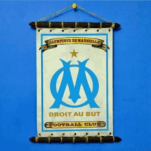 a sign that says olympique de marseille on it