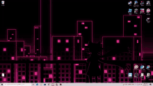 a computer screen shows a silhouette of a cat standing in front of a city skyline