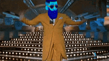 a man with a blue beard and sunglasses is dancing on a stage with a bug radio logo