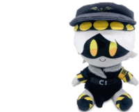 a stuffed animal wearing a hat and a badge that says ci