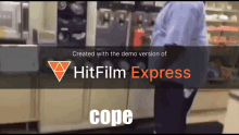 a man is standing in front of a sign that says hit film express