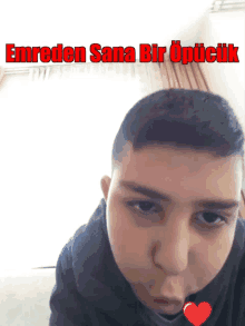 a young man making a funny face with the words emreden sana bir opticit in red letters