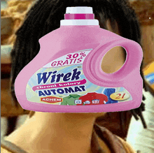 a bottle of wirek automat laundry detergent has a pink cap