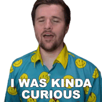 a man wearing a blue shirt with smiley faces on it says " i was kinda curious "