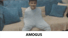 a boy is sitting on a couch with the name amagus written below him