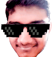 a man wearing a pair of pixelated sunglasses looks at the camera