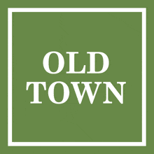 a green sign that says old town in white