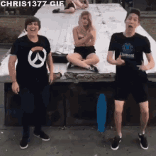 a chris 1377 gif shows a group of young people dancing