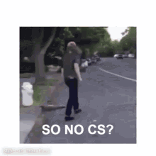 a man is riding a skateboard down a street with the words `` so no cs '' above him .