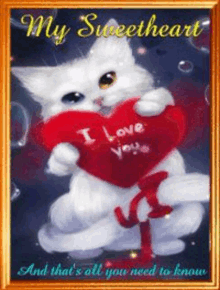 a white cat is holding a heart that says i love you