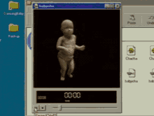 a computer screen shows a baby dancing in a diaper and the time is 00:00