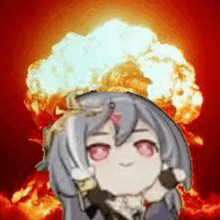 a girl with a gun is standing in front of a huge explosion .