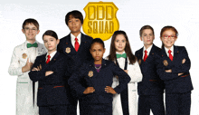 a group of kids are posing for a picture with odd squad behind them