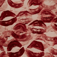 a pattern of red lips on a beige background