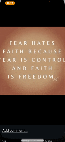 a phone screen with a quote that says fear hates faith