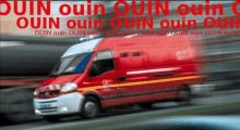 a red ambulance is driving down a street with the words ouin ouin ouin ouin ouin ouin