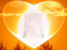 a heart shaped object with lines on it is against an orange sky