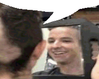 a man looking at his reflection in a mirror and smiling