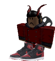 a cartoon character with horns and a sad face is wearing a pair of red and black nike shoes