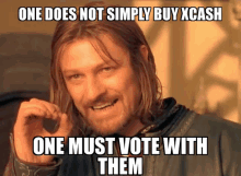 a man with long hair and a beard is smiling and holding a coin with the words one does not simply buy xcash